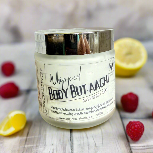 Whipped Body Butter jar on a wooden surface